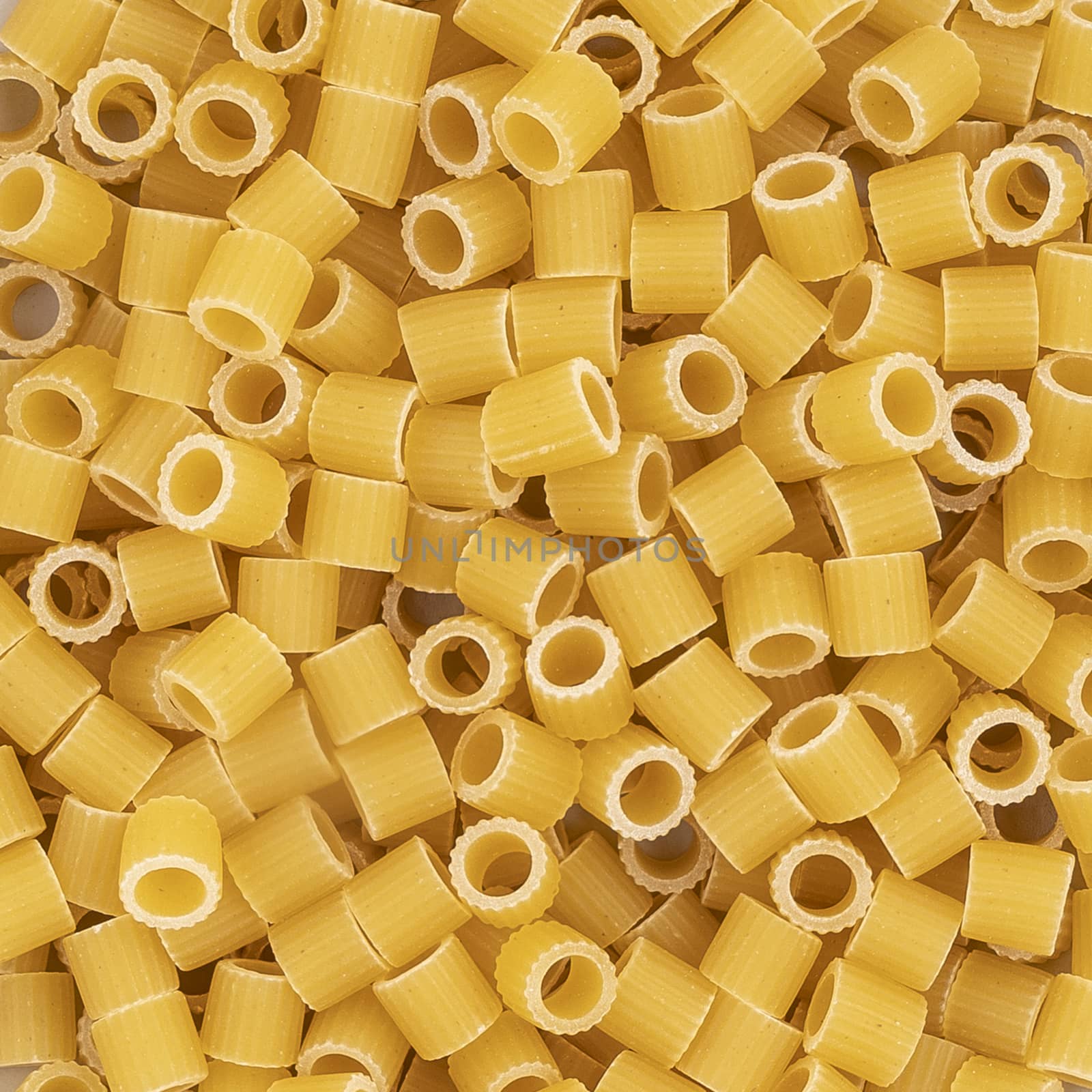 some small pieces of dried pasta as a background