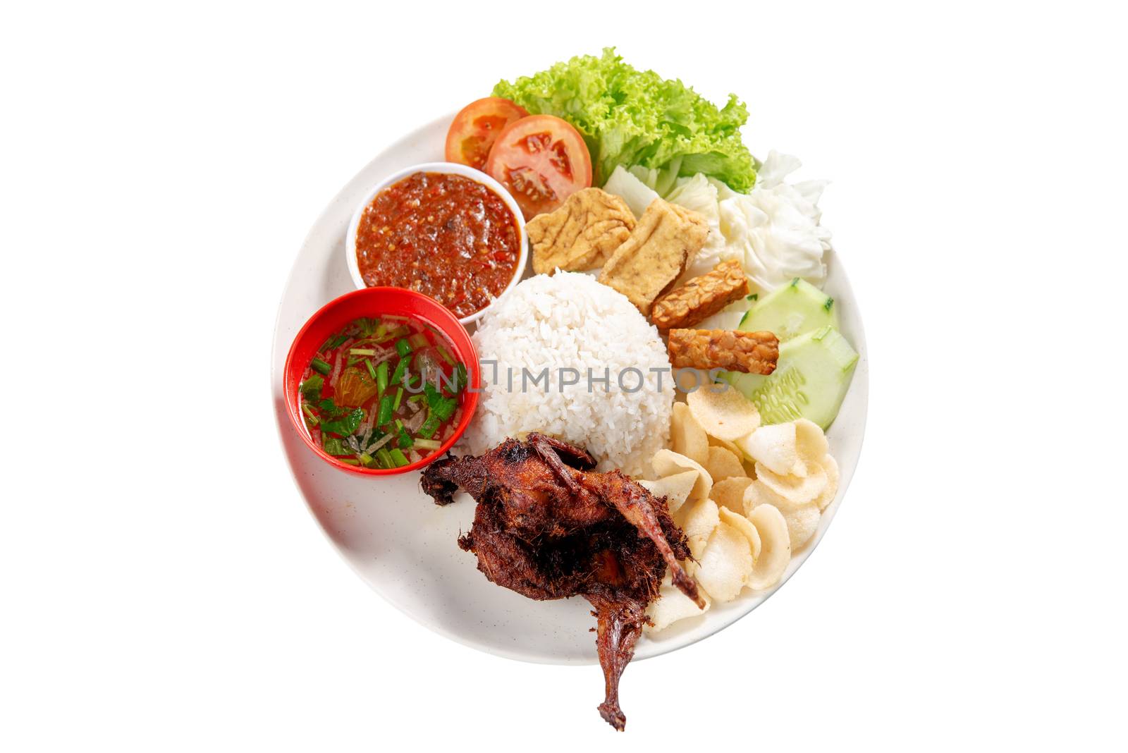 Nasi lemak kukus with quail meat, popular traditional Malaysian local food. Isolated on white background. Flat lay top down overhead view.