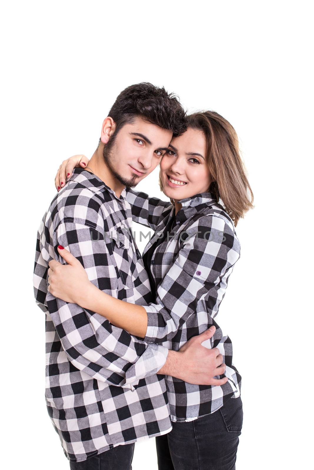 Loving couple hugging and smiling isolated on white