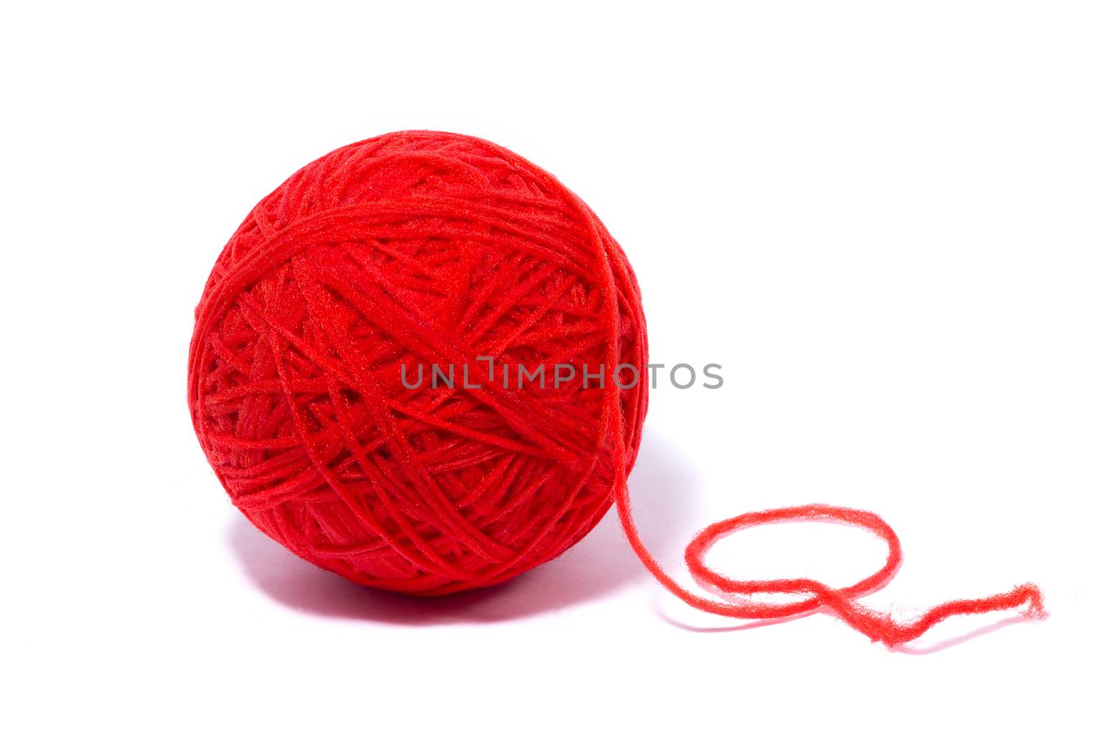 red ball of yarn for knitting, isolate, homemade crafts