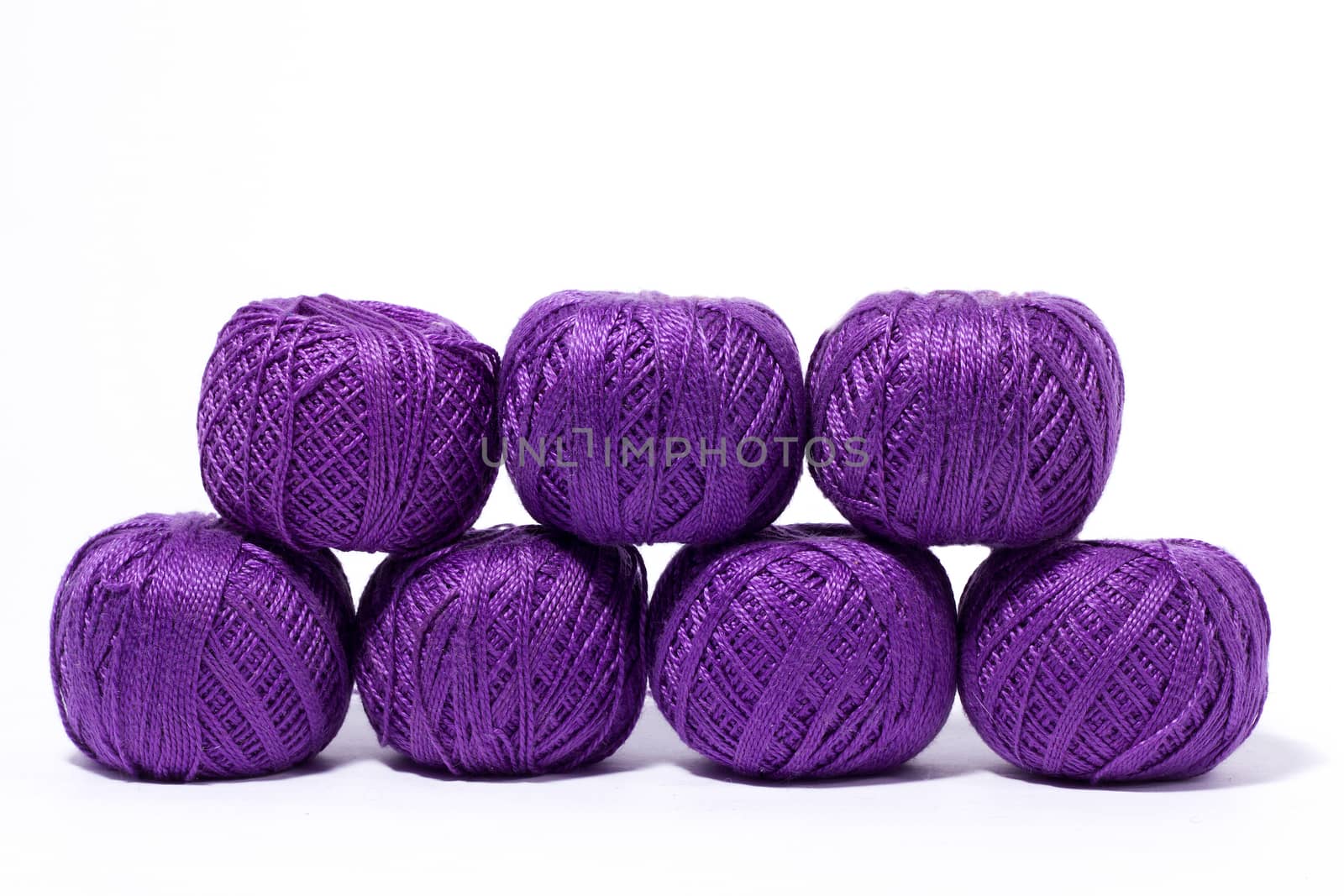 a ball of yellow knitting yarn, isolate, homemade handicrafts, woolen yarn