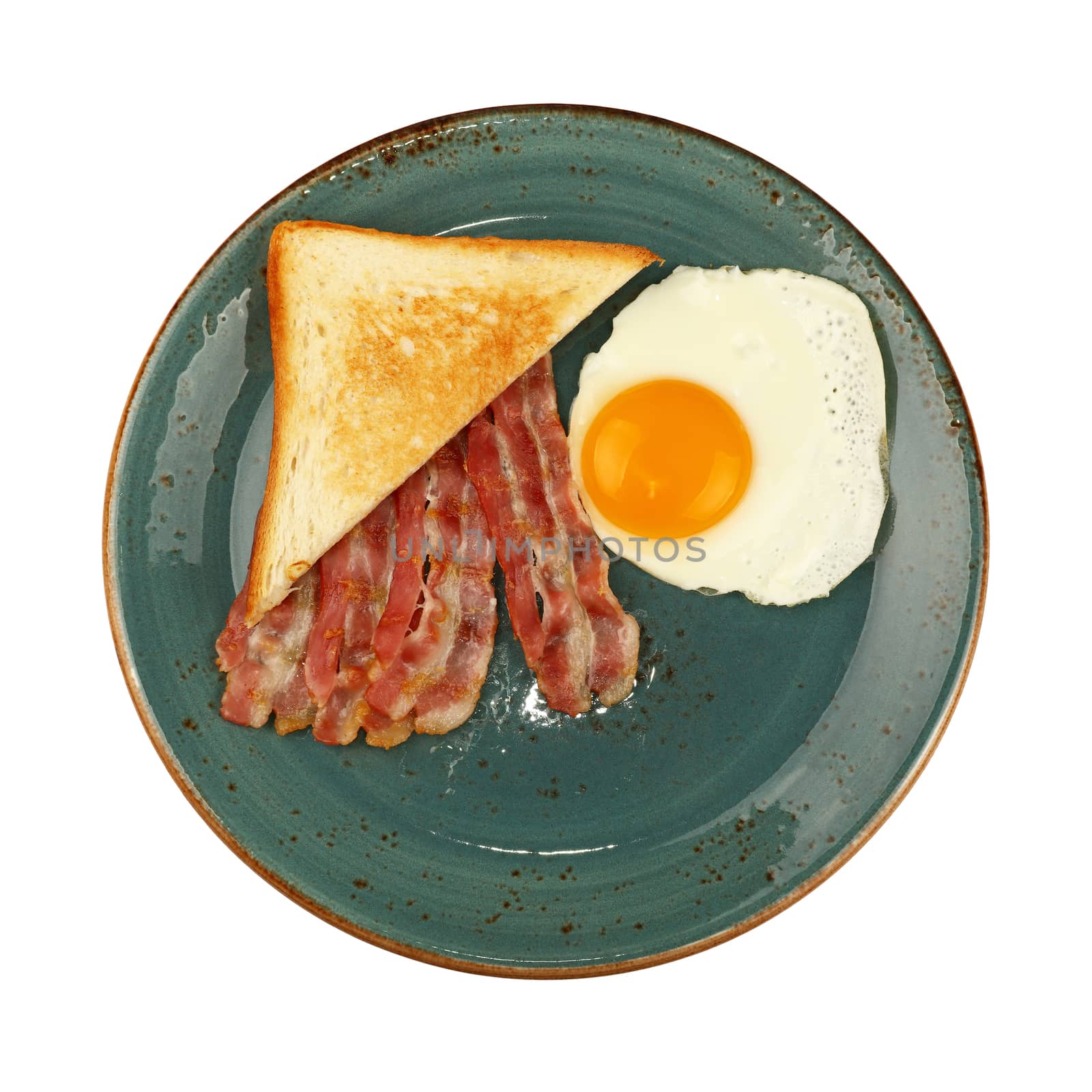 Close up egg, toast and bacon on blue plate by BreakingTheWalls