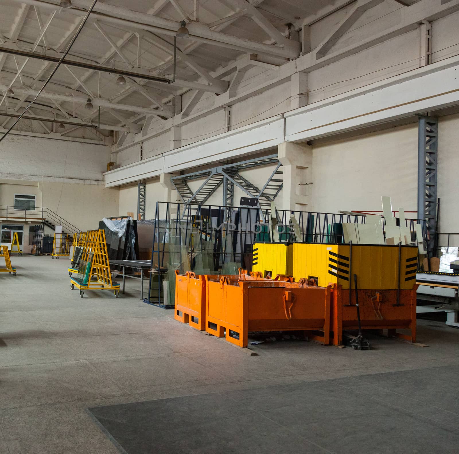 The interior of a large glass and mirror cutting factory
