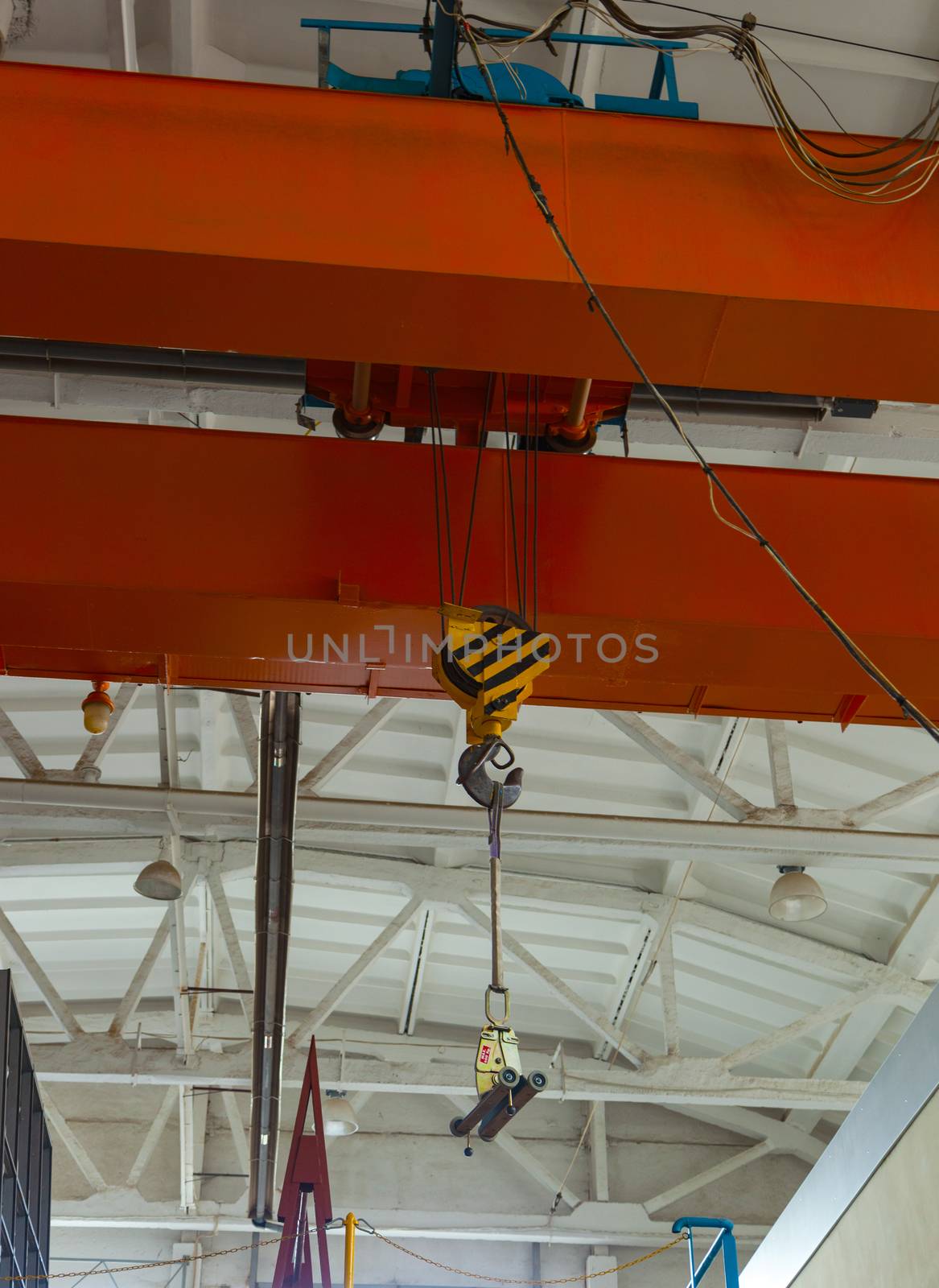 Factory bridge crane for lifting cargo in an enterprise