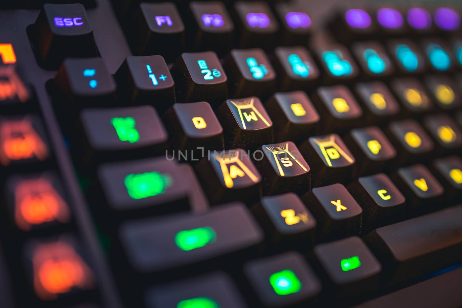 Romer-G backlit mechanical keyboard WSAD buttons detail shot. Gaming Keys.