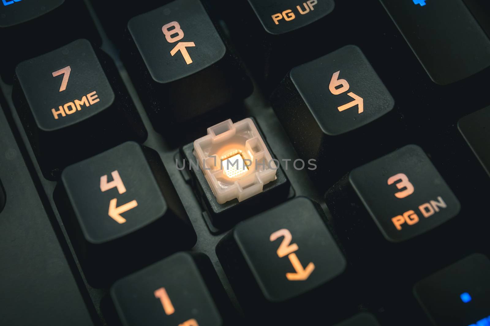 Backlit mechanical keyboard numerical buttons detail shot. by petrsvoboda91