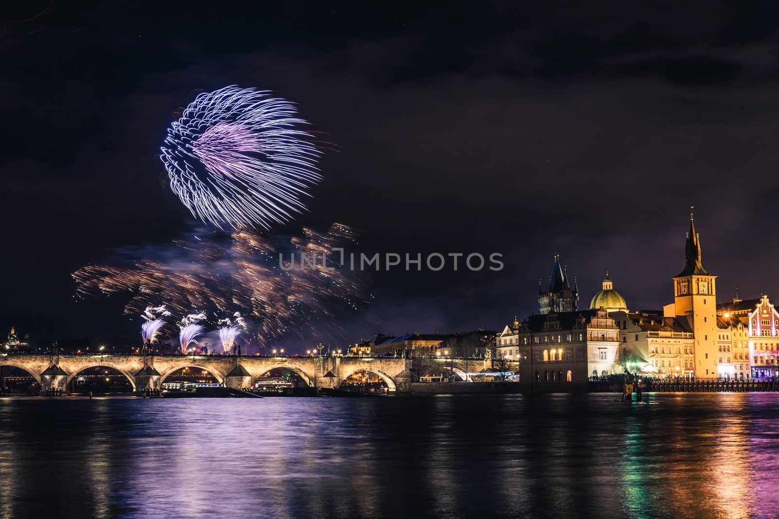 Beautiful fireworks above Charles bridge at night in Prague, Czech Republic. by petrsvoboda91