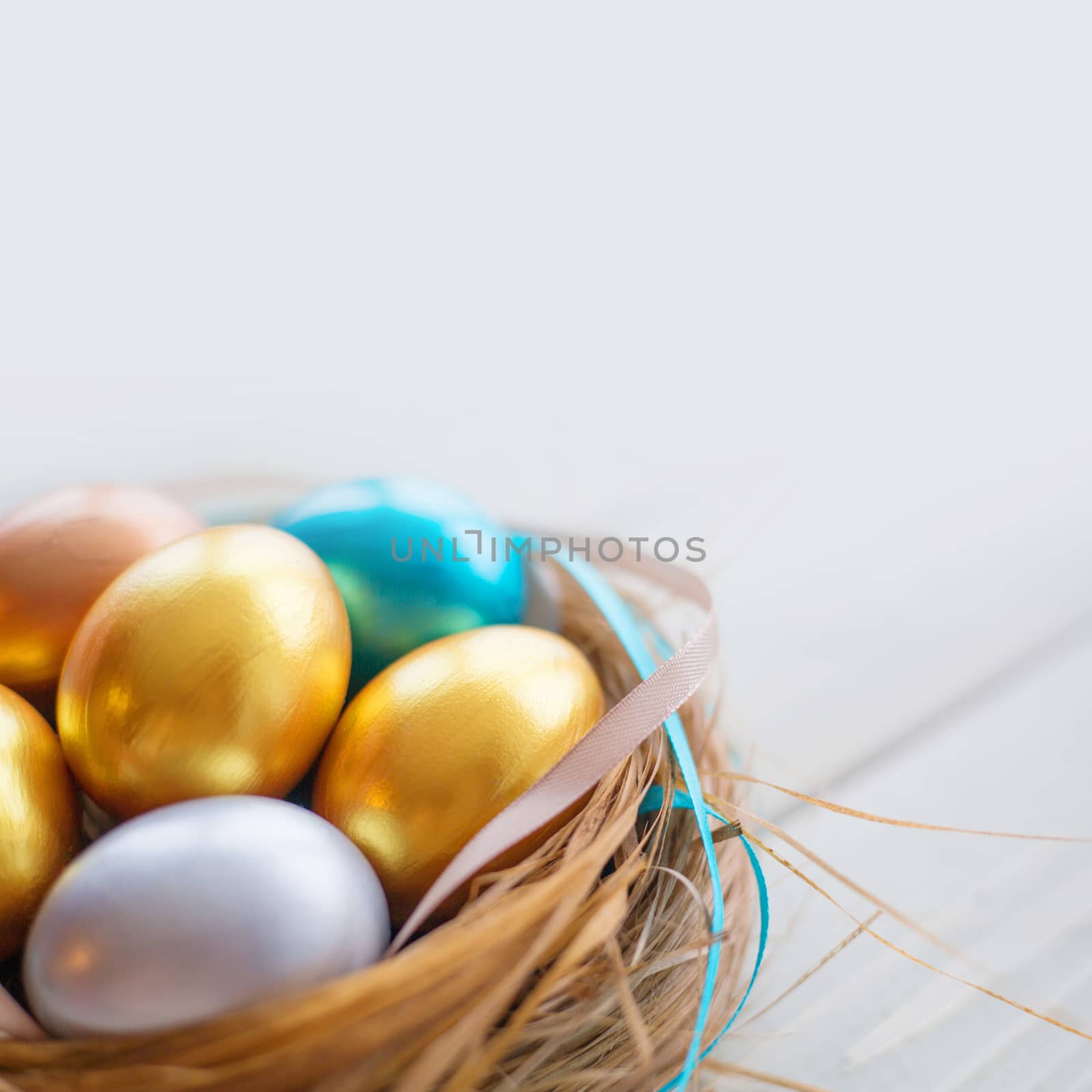 Decorated easter nest with eggs by destillat