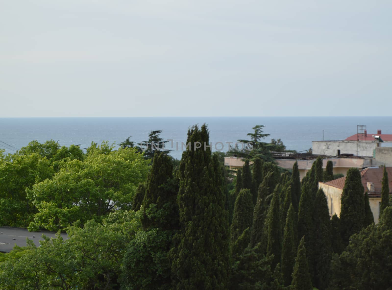 Sea view and hotel buildings from the balcony, early morning.