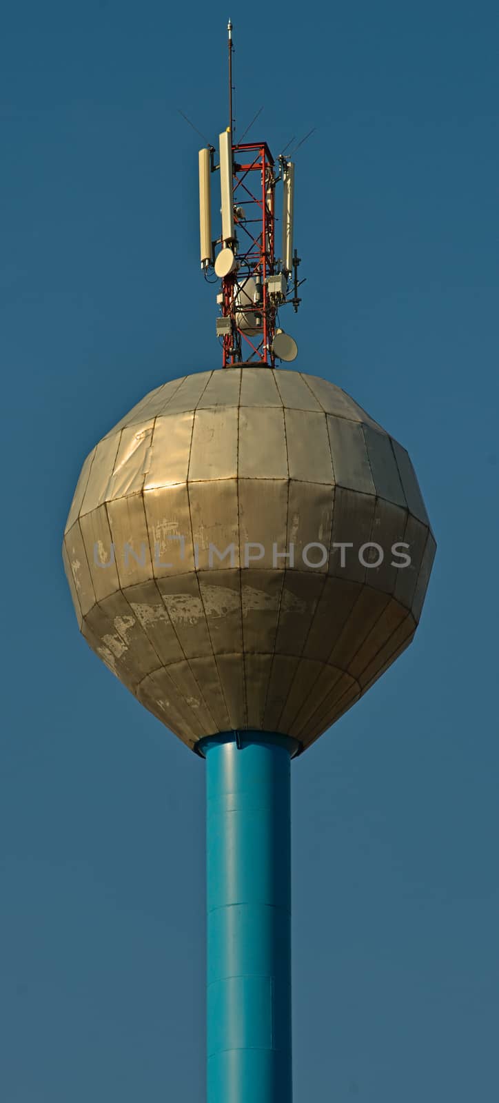 Water tower with antennas on top of it by sheriffkule