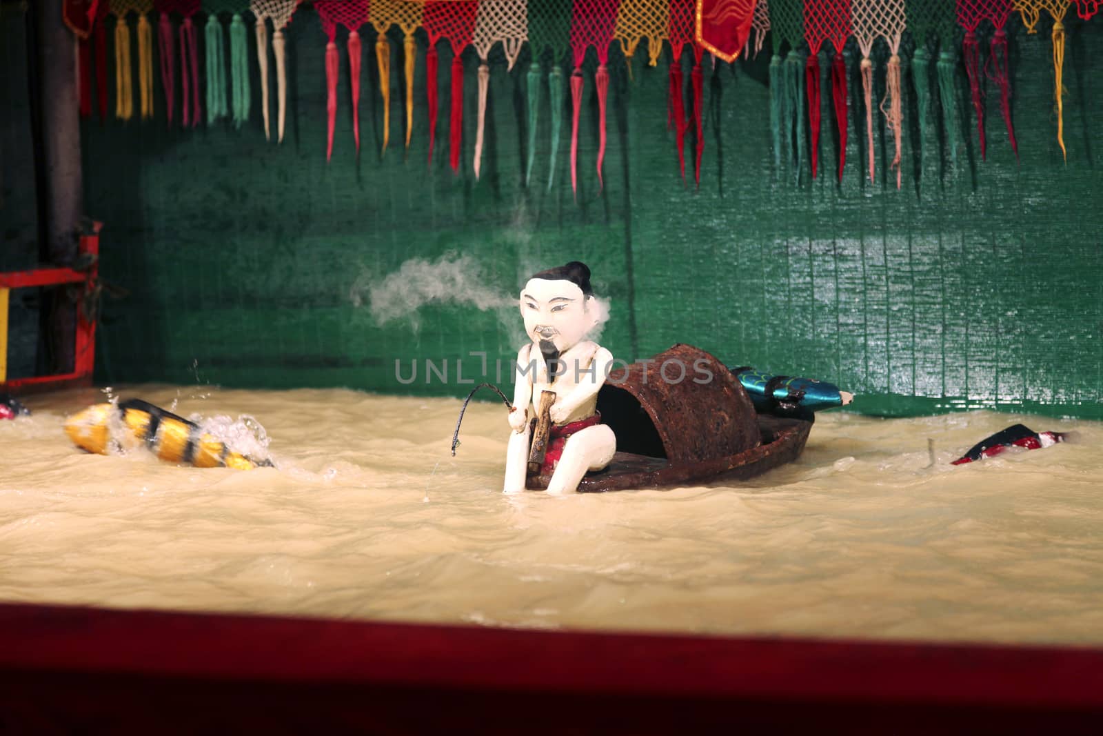 SAIGON, VIETNAM - JANUARY 05, 2015 - Traditional vietnamese water puppet theater
