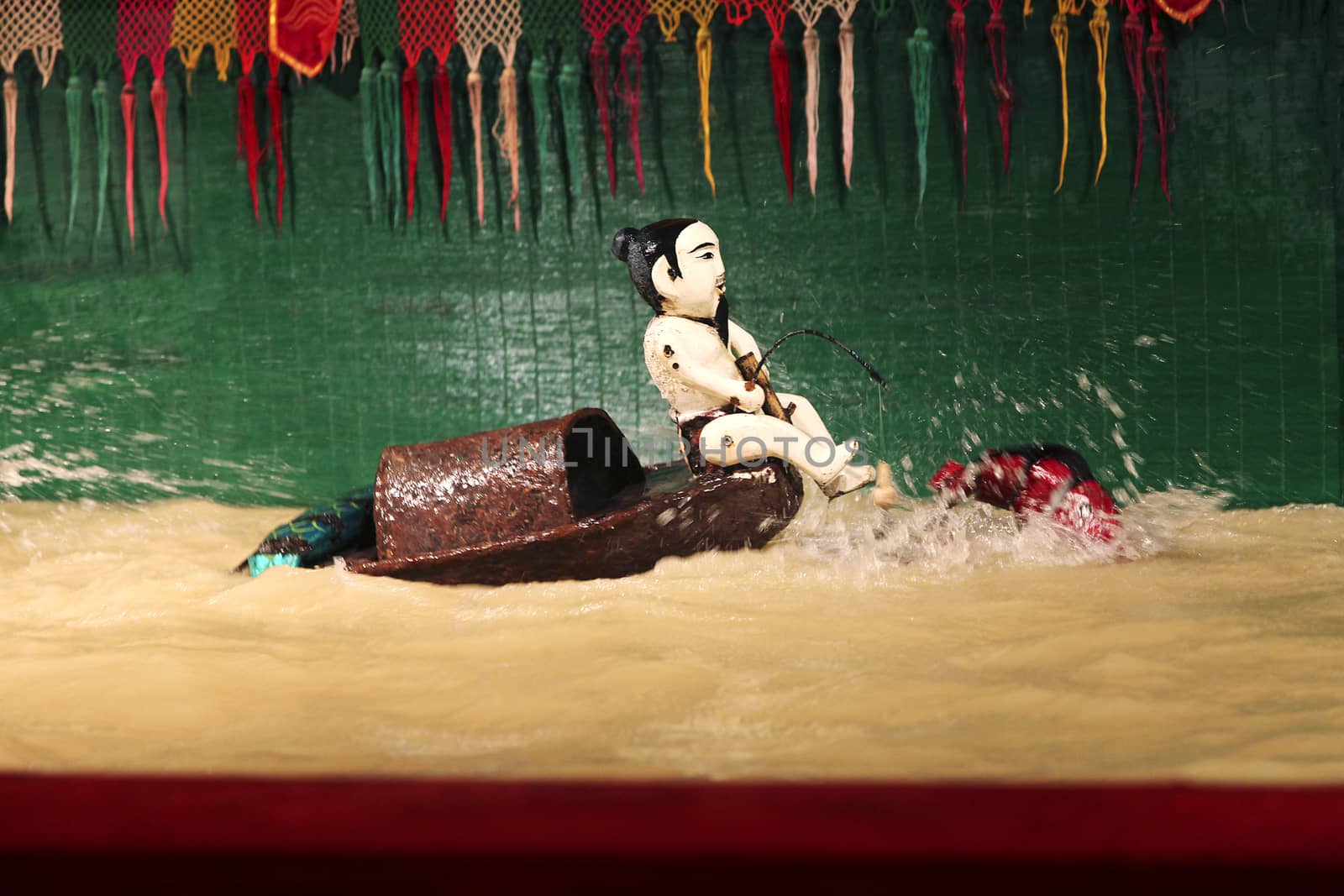 SAIGON, VIETNAM - JANUARY 05, 2015 - Traditional vietnamese water puppet theater