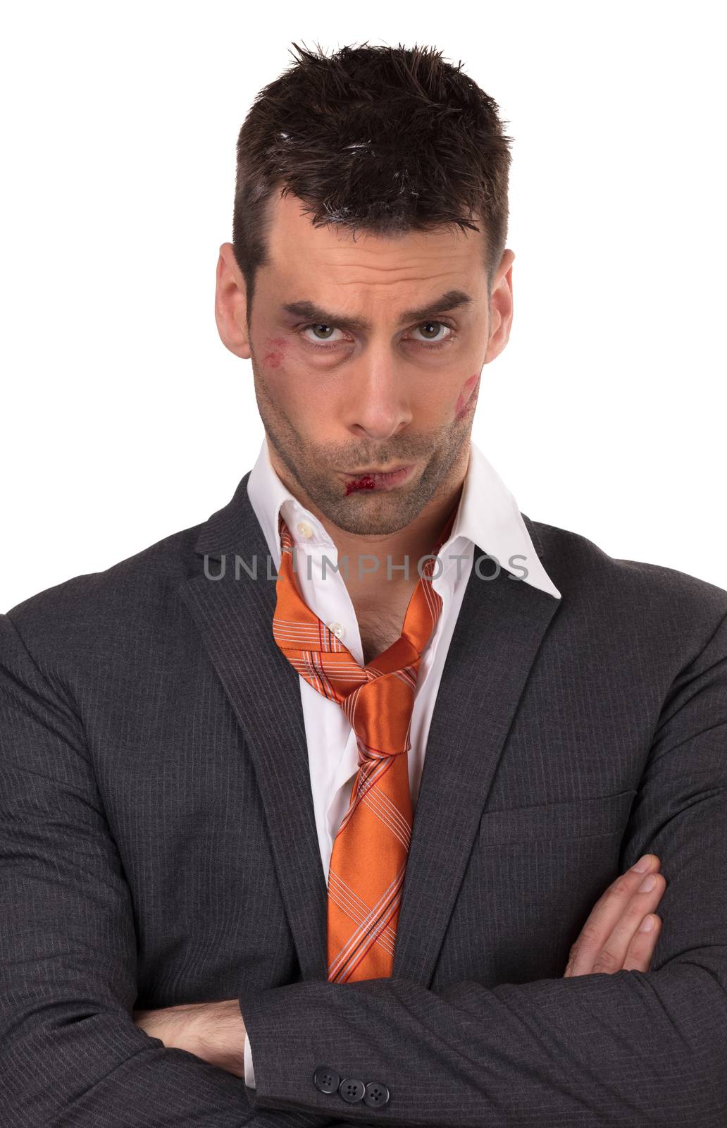 Close up of a businessman with bloody lip, beaten and bruised, isolated