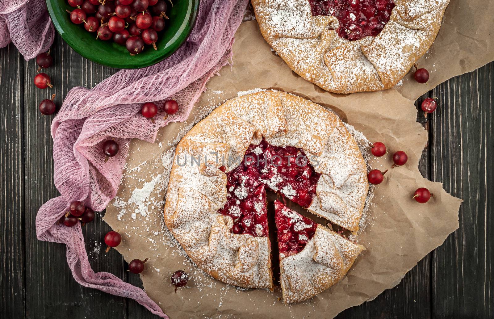 Galette with gooseberries top view by Cipariss