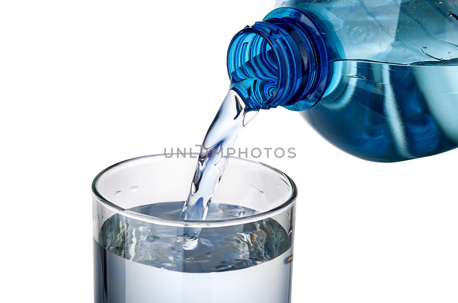 Water pouring into a glass. Glass cup and plastic bottle. Isolated on white background.