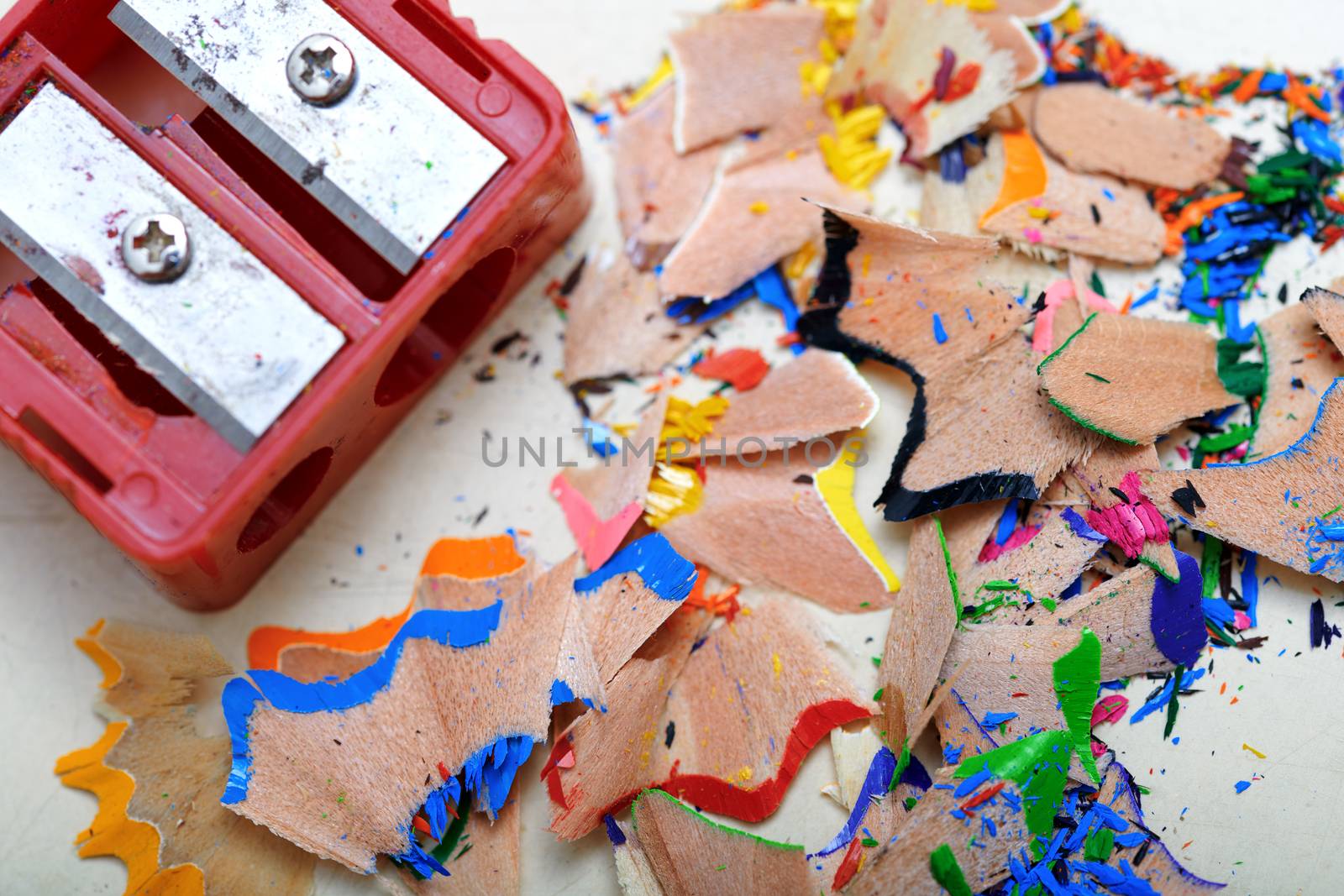 Sharpener and colored pencil shavings