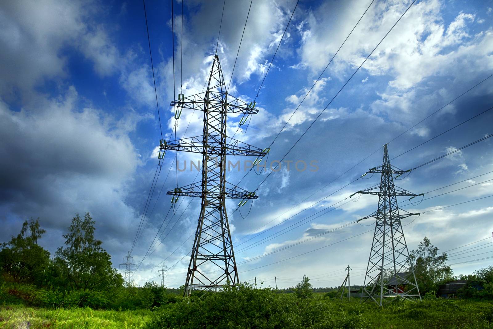 transmission tower on blue sky background by friday