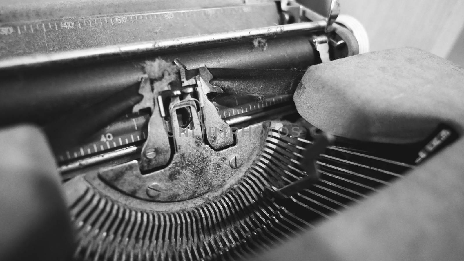 Old typewriter machine in good condition with no paper in feed  by gnepphoto