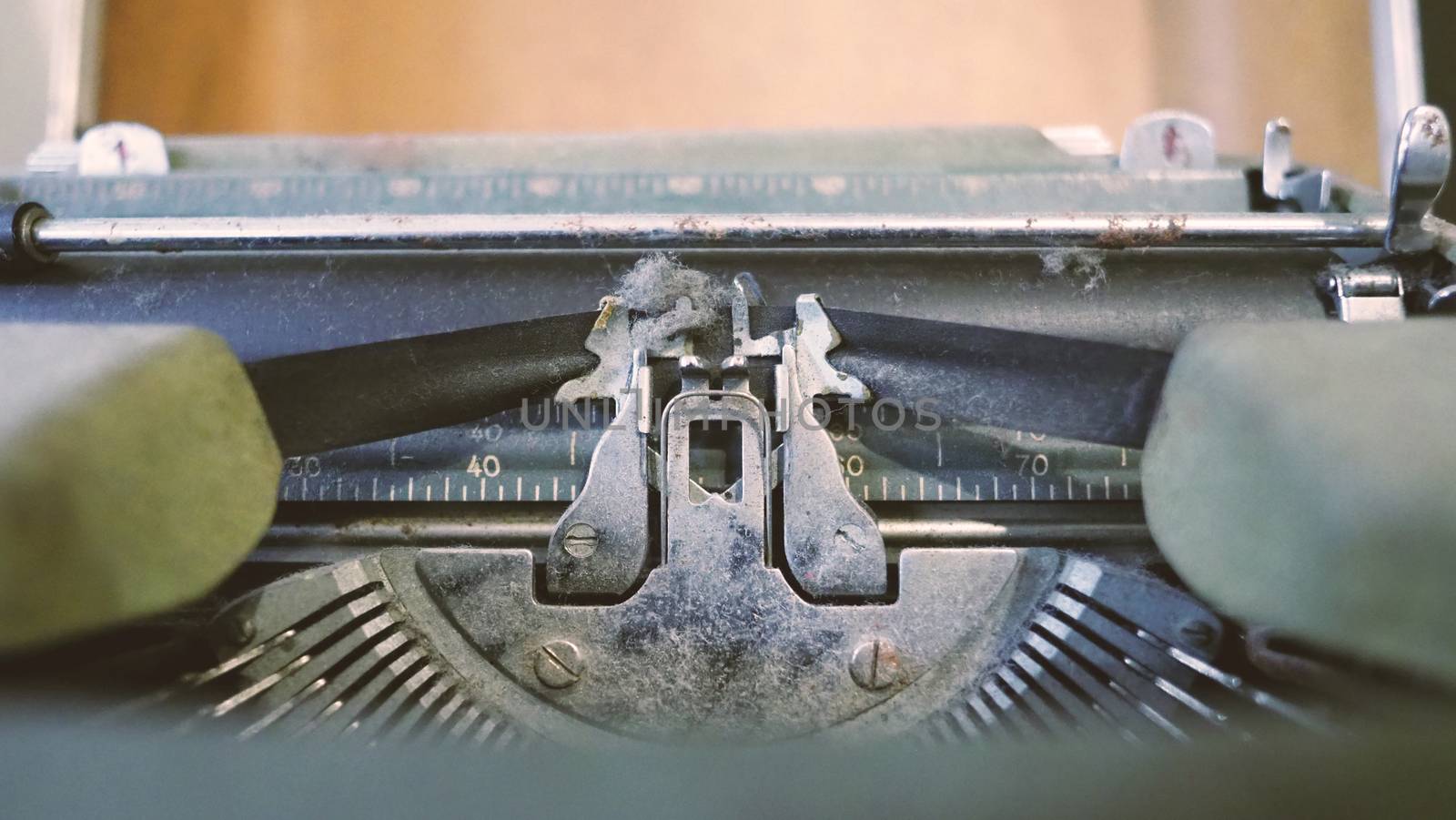 Old typewriter machine in good condition with no paper in feed  by gnepphoto