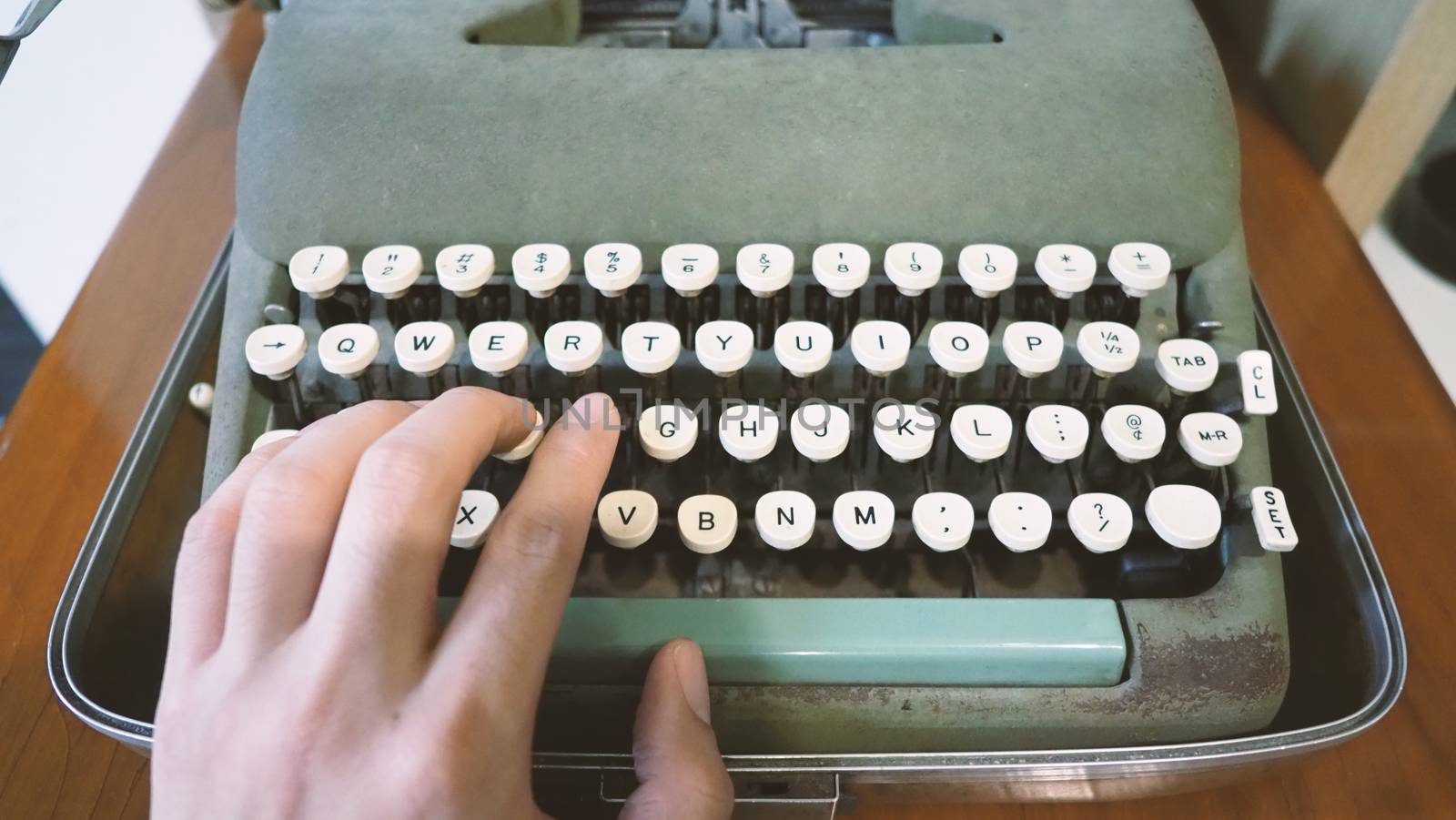 Old typewriter machine in good condition with no paper in feed for use in the past job career such as write office document, copywriter, author, news journalist, secretary, creative and more. 