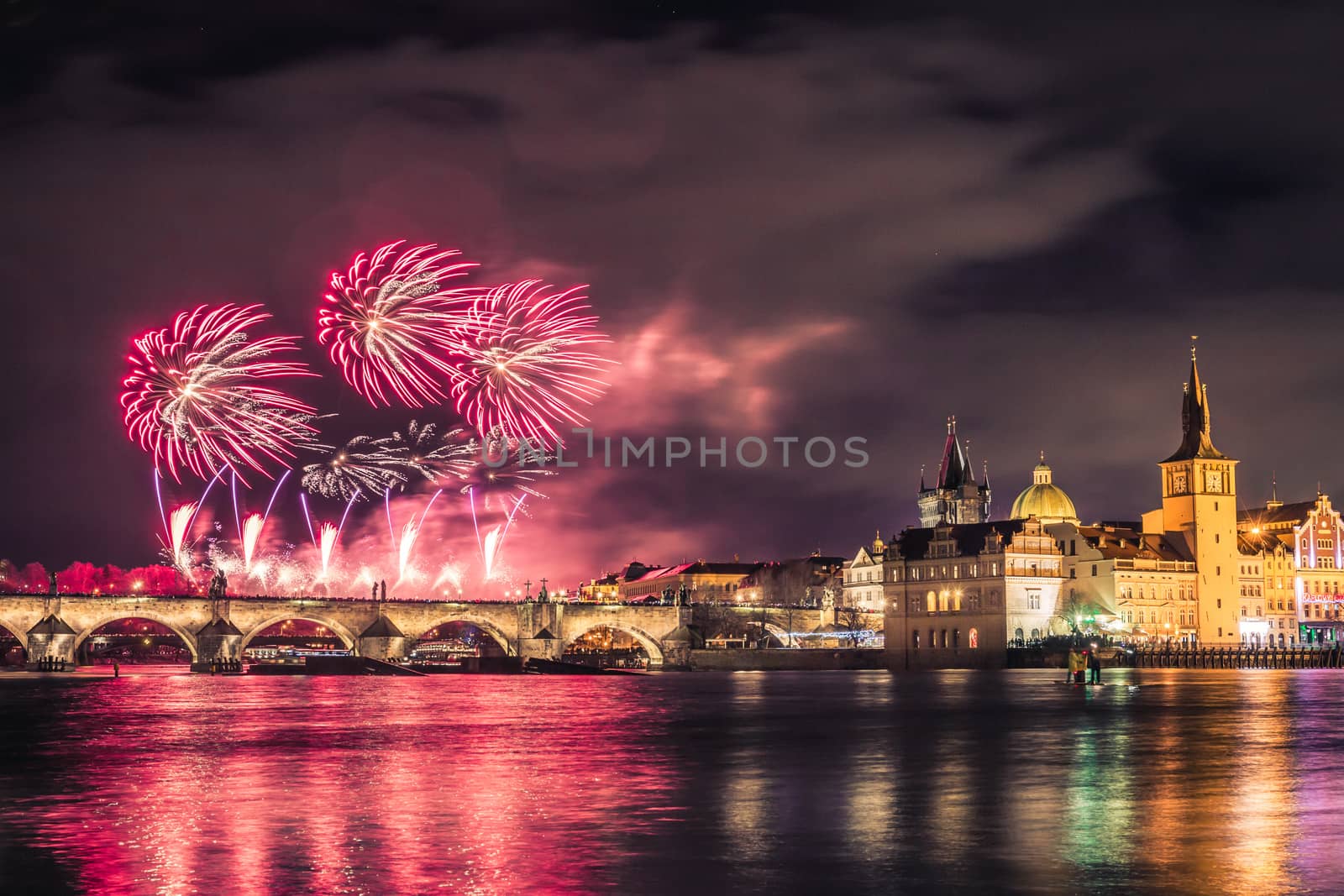 Beautiful fireworks above Charles bridge at night in Prague, Czech Republic. by petrsvoboda91