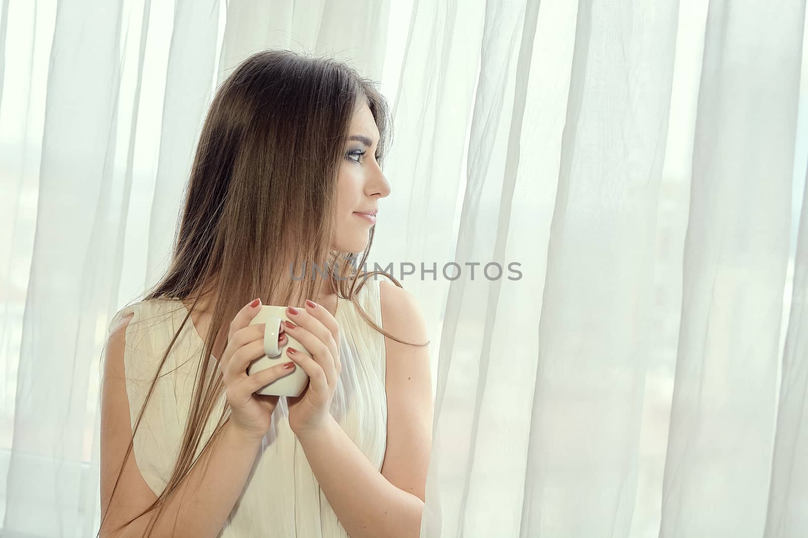 Girl with cup of coffee for concept design. People beauty fashion. Food concept. Closeup woman portrait. Morning coffee. Beautiful morning. Greetings of new day. Relax concept.