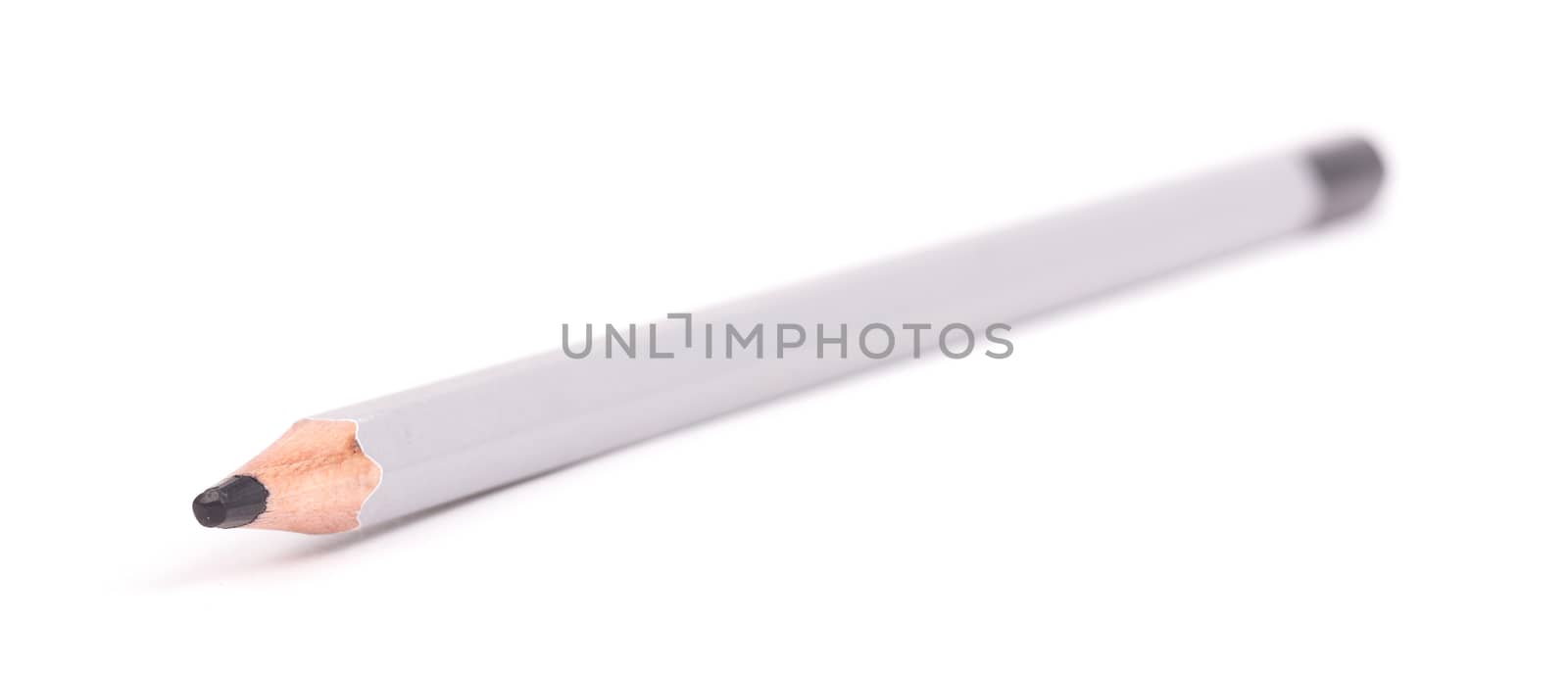 Wooden color pencil, selective focus, isolated on a pure white background - black