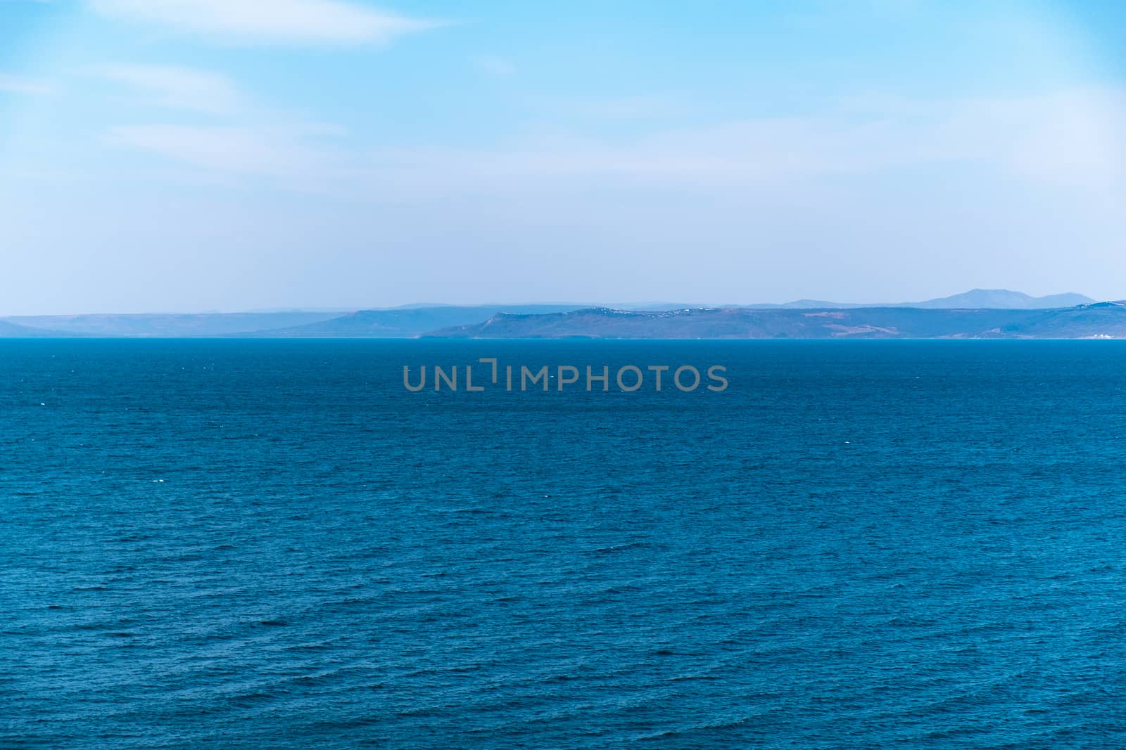 Sea view from the city of Vladivostok. Mountains on the other side of the sea.