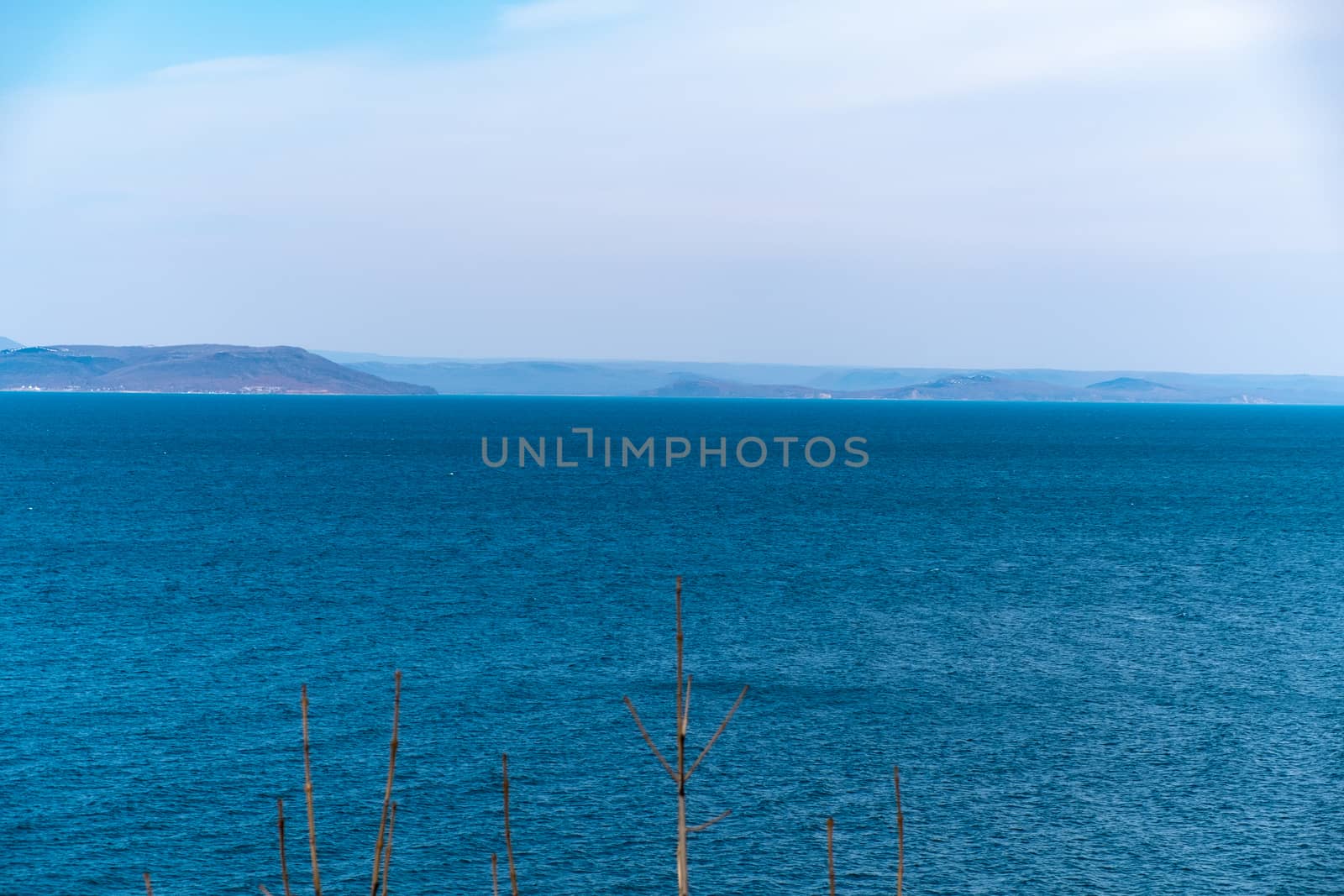 Sea view from the city of Vladivostok. Mountains on the other side of the sea.