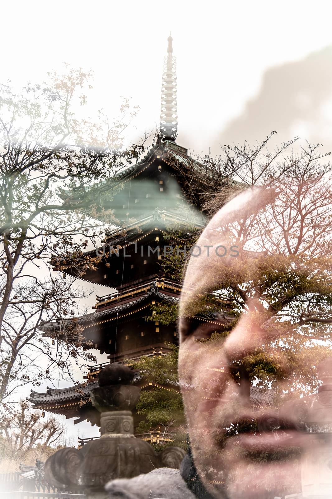 Double exposure of traveller and five story pagoda