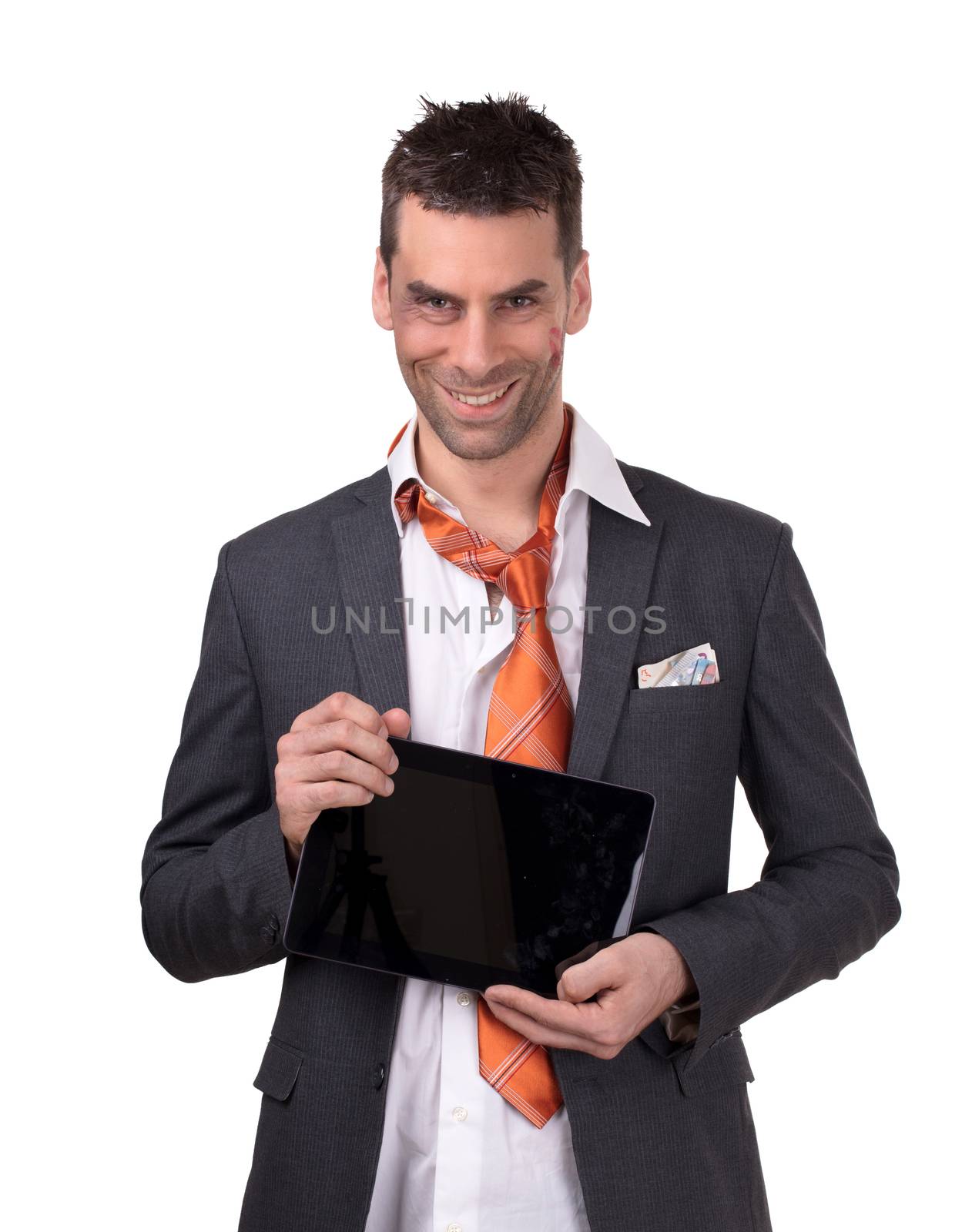 Beaten business man, tablet in hand, isolated on white