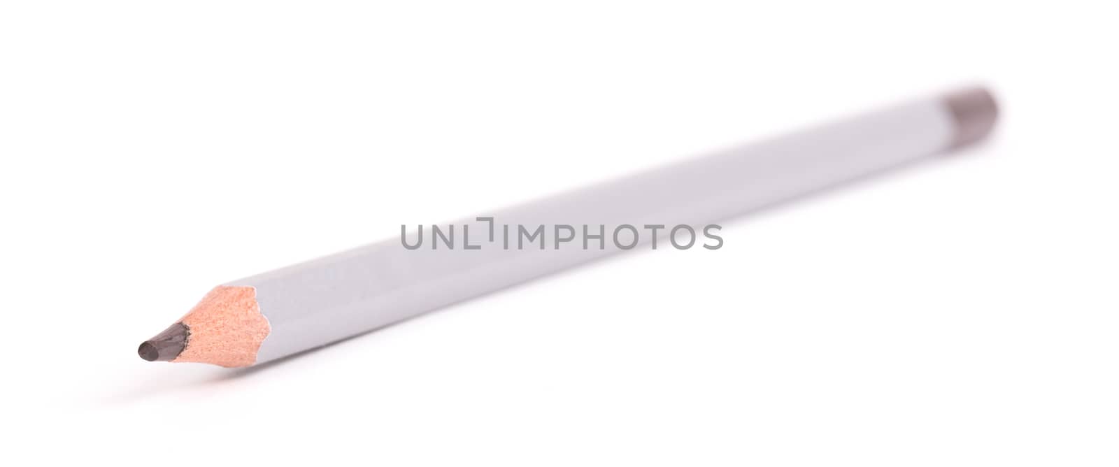 Wooden color pencil, selective focus, isolated on a pure white background - brown