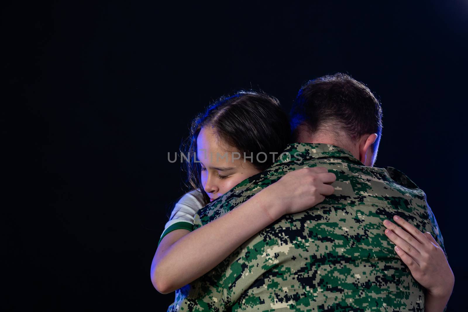 Soldier hugs daughter on departing or returning  by imagesbykenny