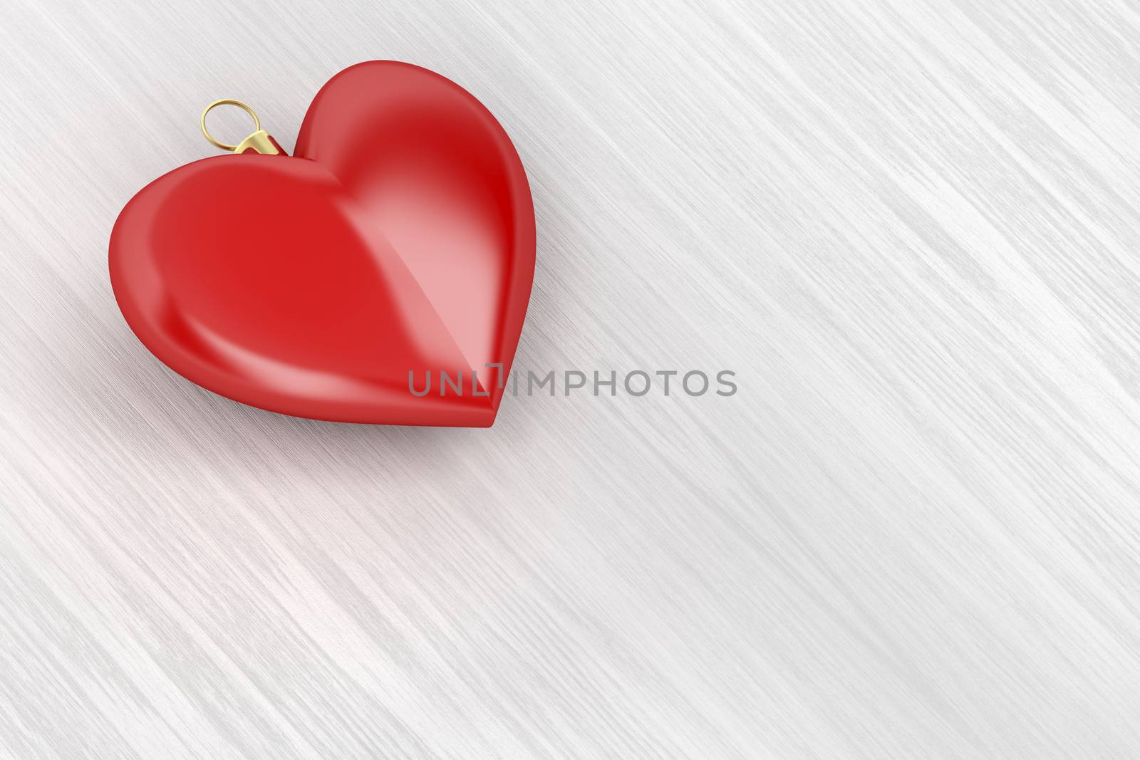 Heart shaped Christmas ball on wood background