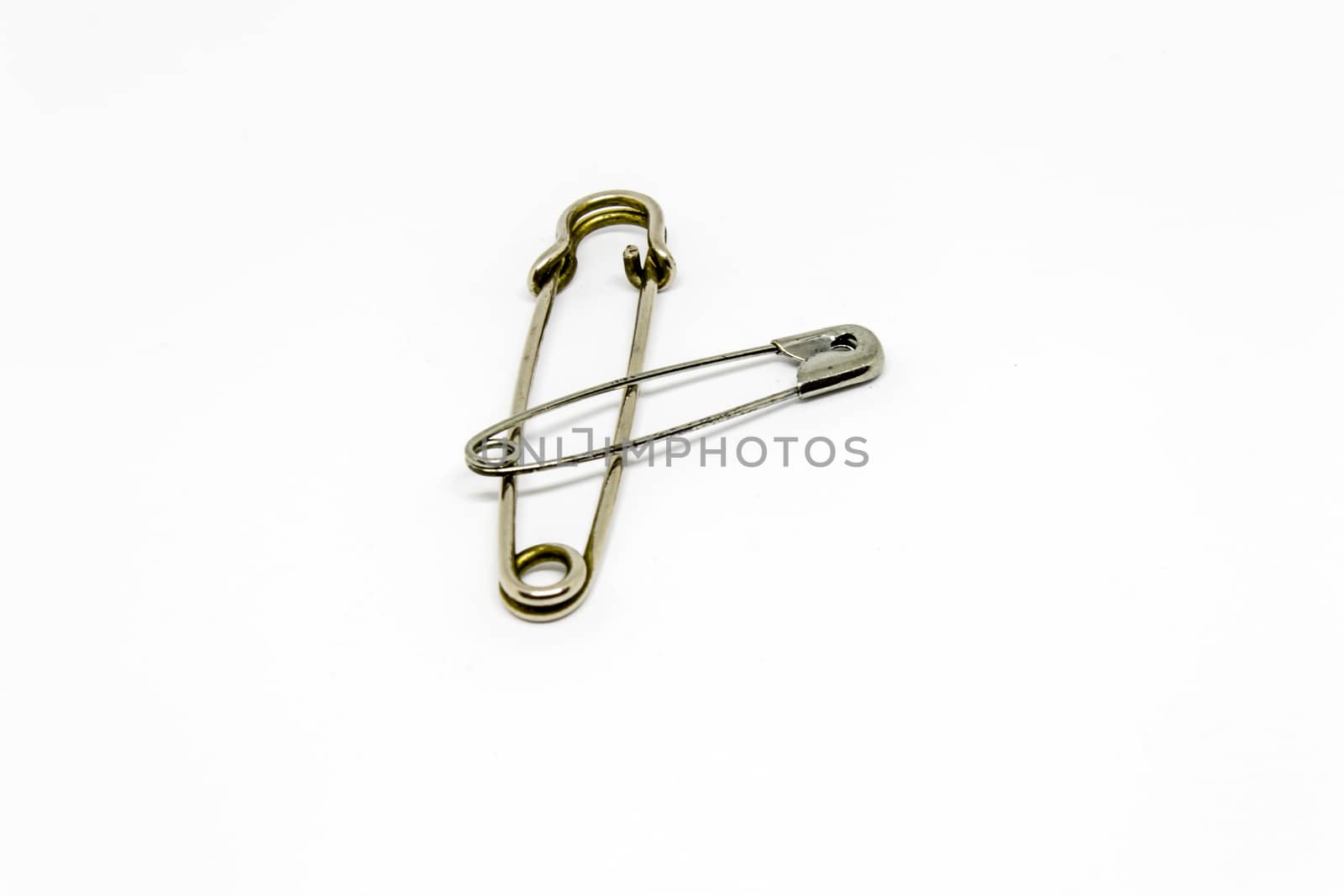 two hooked needle with white background. can be used as product photo.