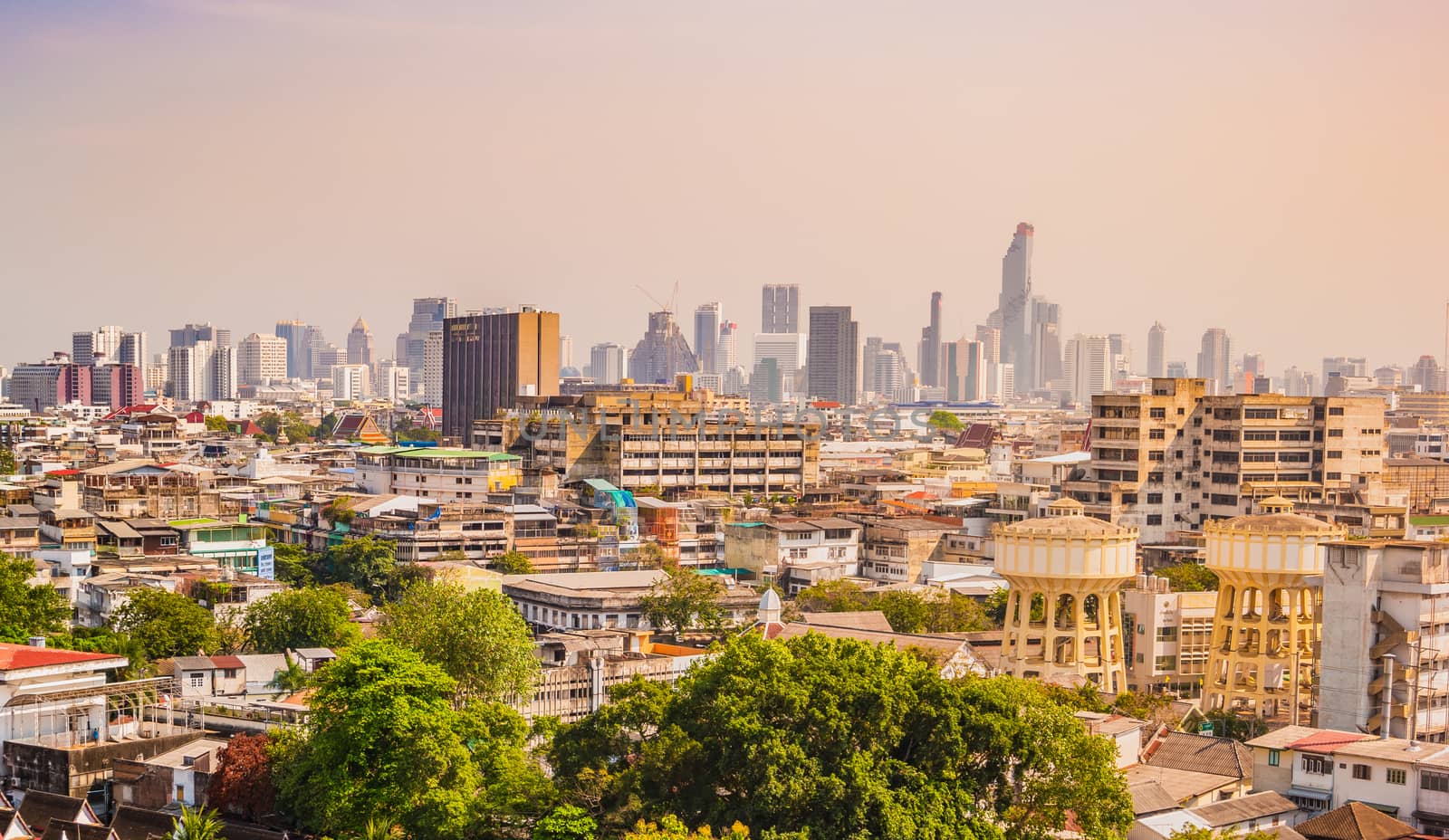 Bangkok City downtown cityscape urban skyline in the mist or smog. Wide and High view image of Bangkok city in the soft light