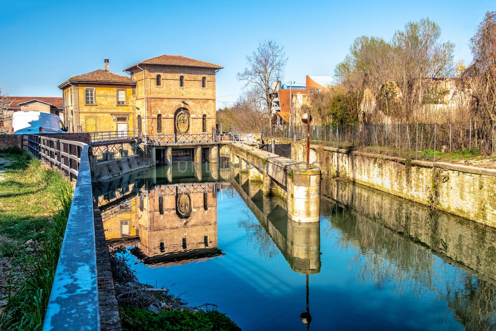 Bologna Battiferro Navile canal river lock - an historic landmark of the italian city .