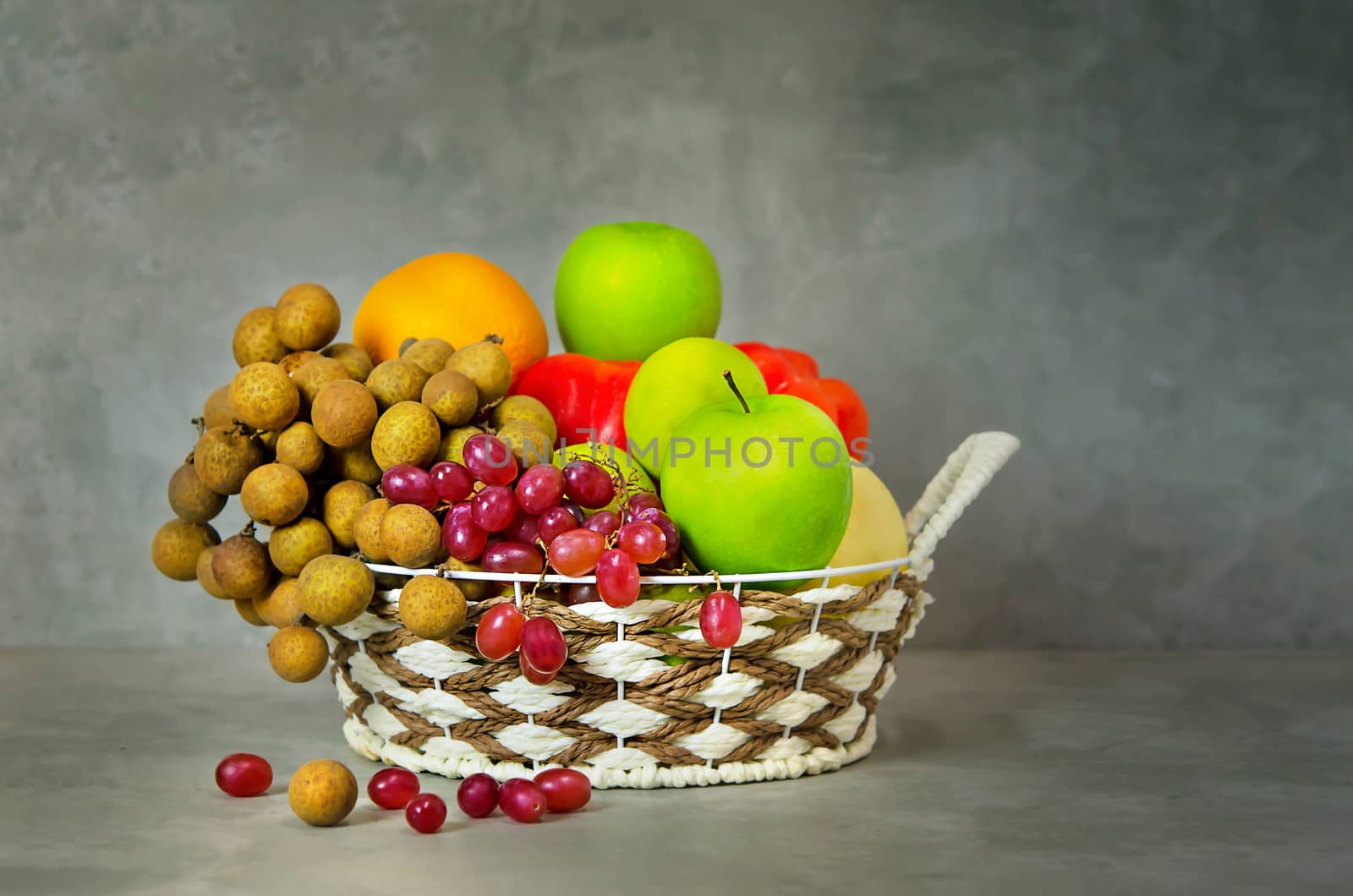 vegetables and fruits in wicker basket  by rakratchada