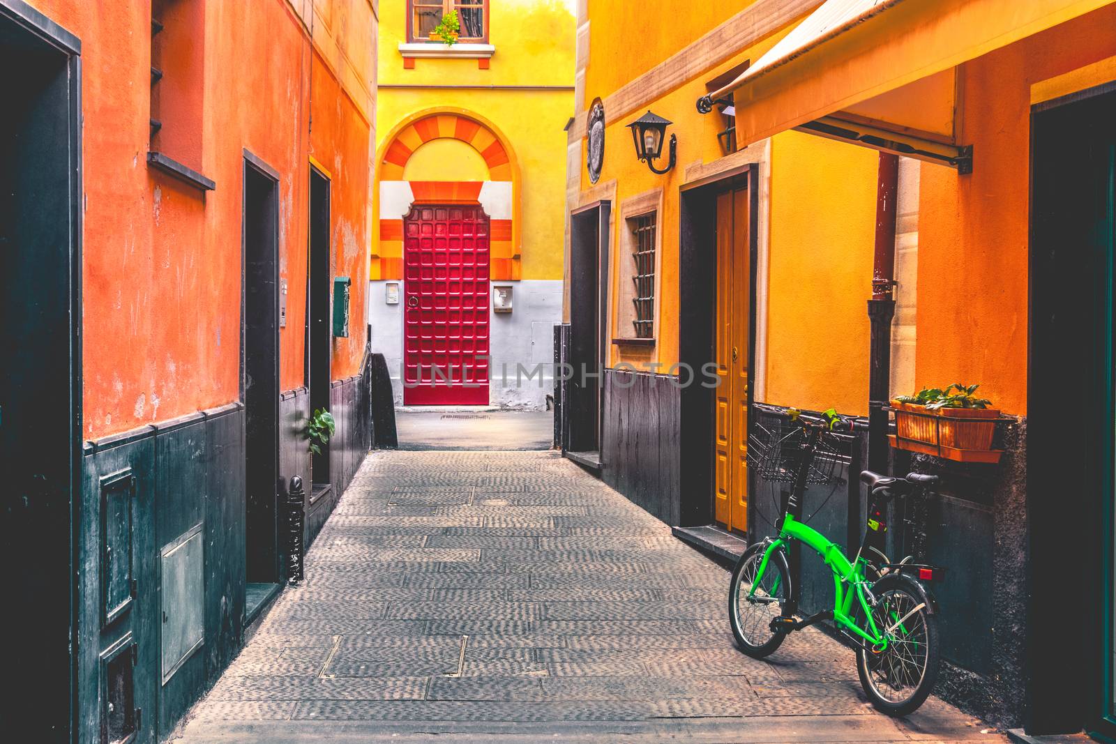 colorful italian alley bike village .