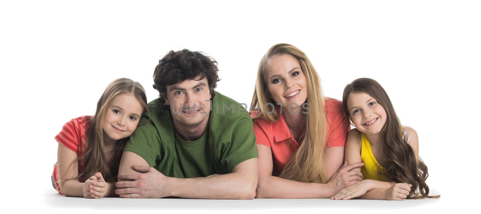 Casual family with two children laying isolated on white background