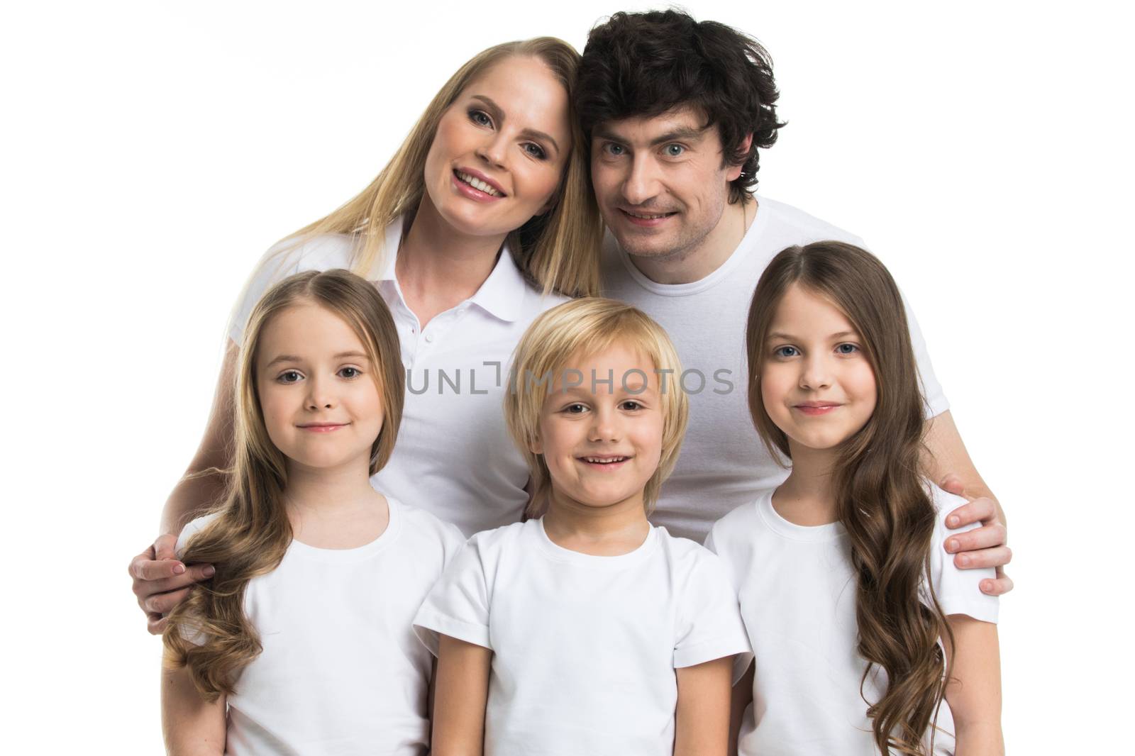 Portrait of happy smiling family of two parents and three children isolated on white background