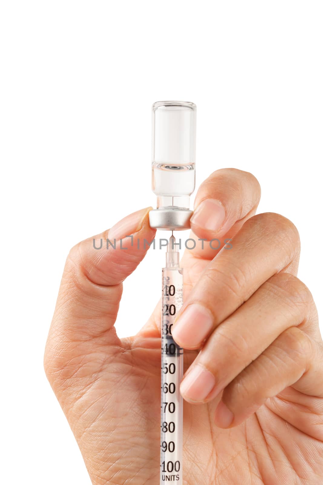 Syringe, medical injection vaccination in hand isolated on white by Gamjai