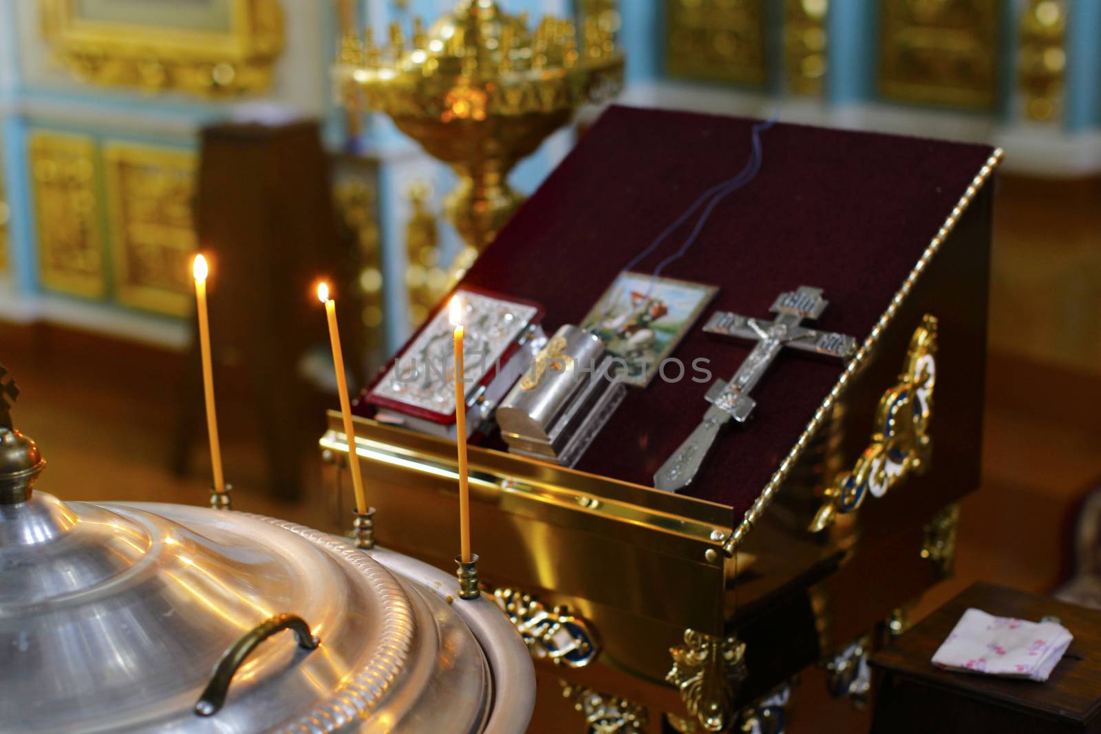 Church accessories. Church objects are candles of a vat for baptism. Church accessories for baptism