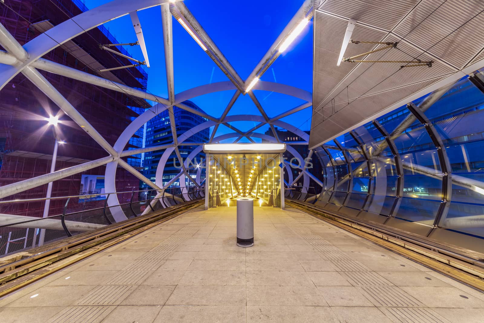 The Hague Beatrixkwartier tram station platform illumated at night waiting for passengers during the blue hour, The Hague, Netherlands
