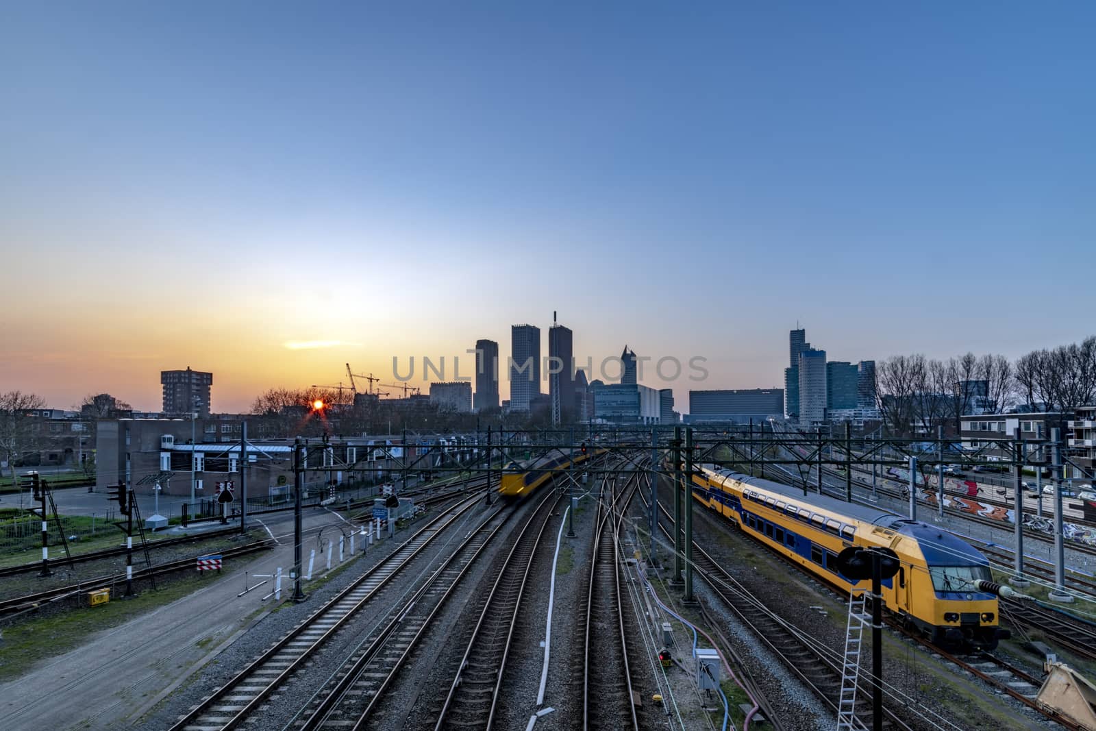 The Hague (Den Haag in Dutch) skyline during the sunset moment behind the train station by ankorlight