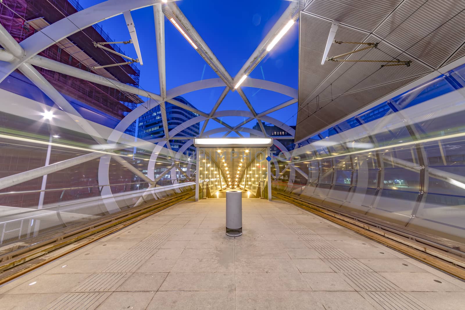 The Hague Beatrixkwartier tram station platform illumated at night waiting for passengers during the blue hour, The Hague, Netherlands
 by ankorlight