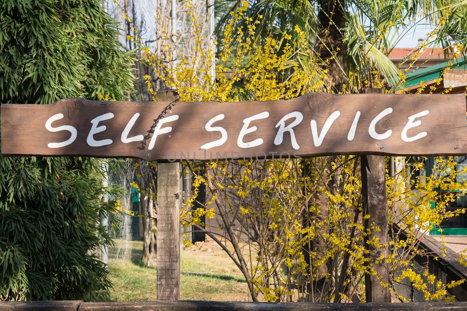 Sign with written "self service", horizontal photo.