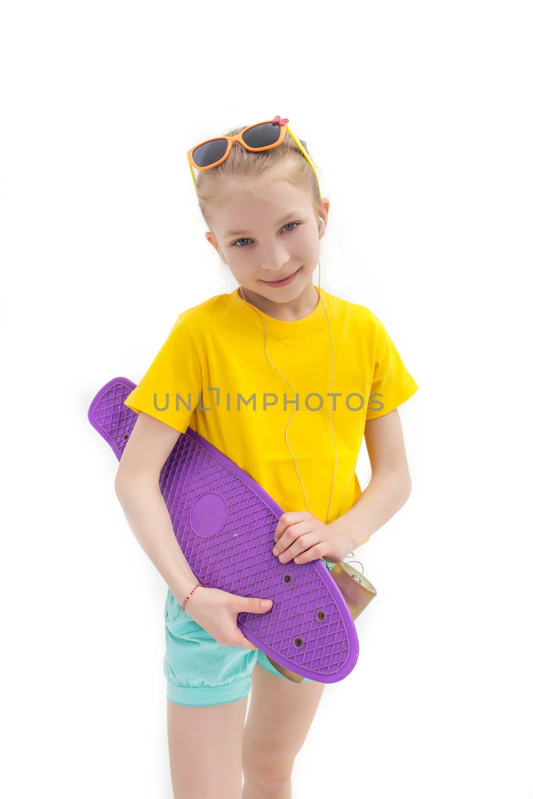 Girl standing with violete skateboard isolated on white by Angel_a