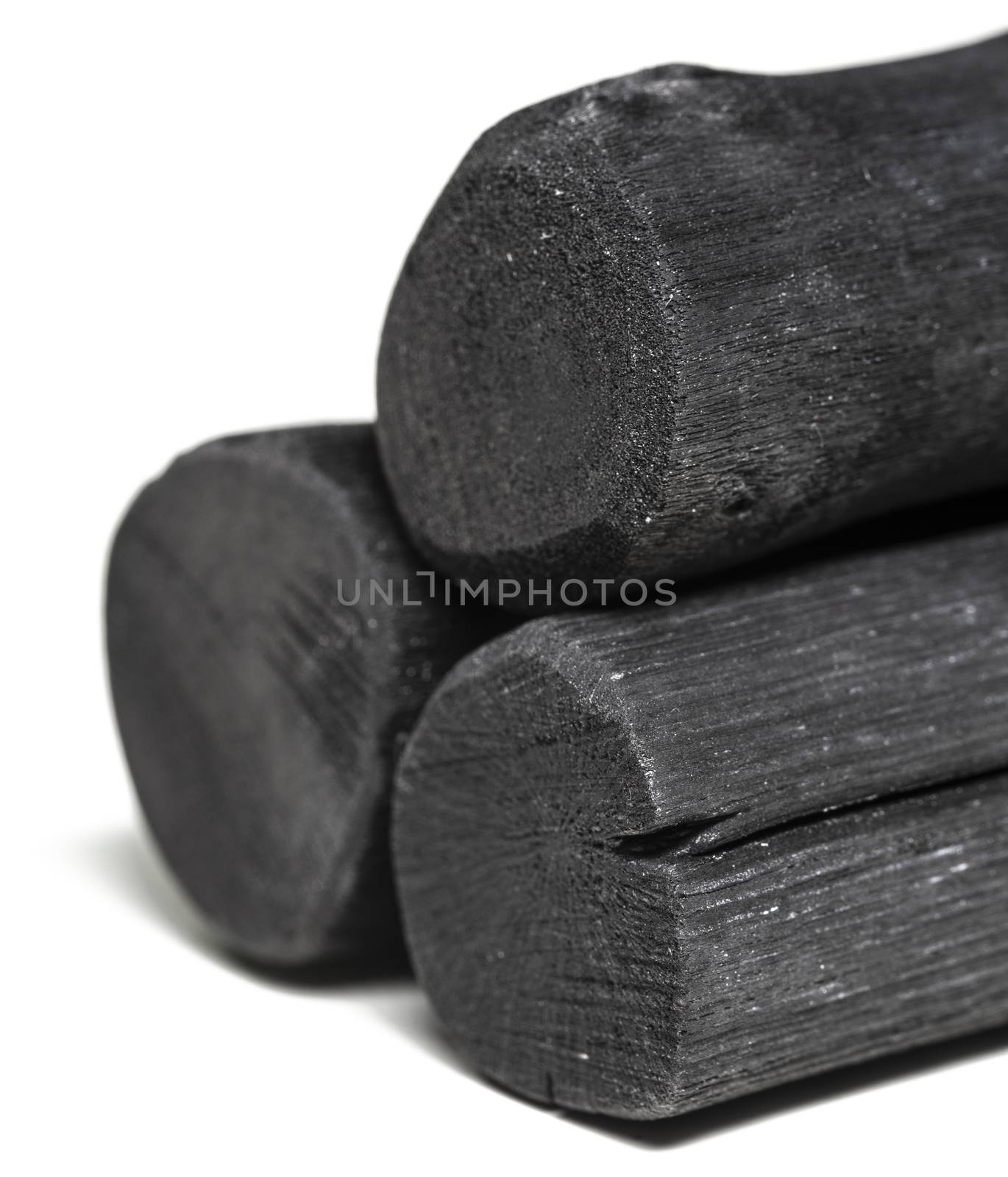 Binchotan Charcoal Stick Over White Background by Olivier-Le-Moal