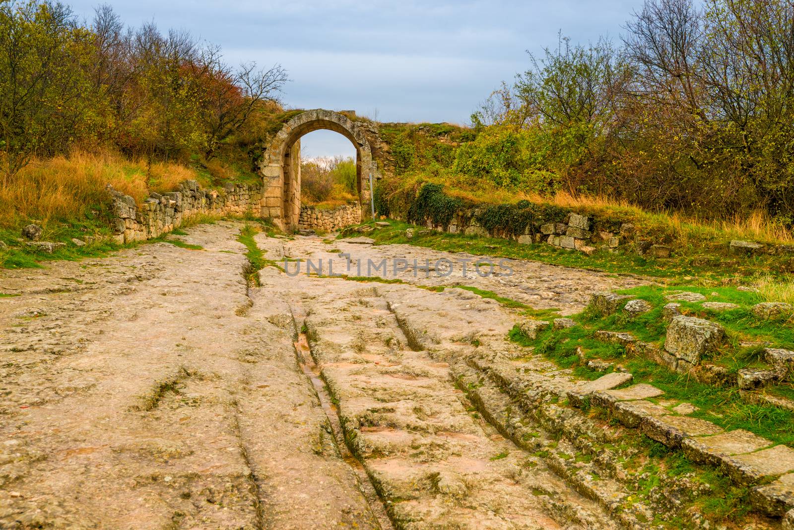 Road and arch in the cave town of Chufut-Kale, landmark of the C by kosmsos111